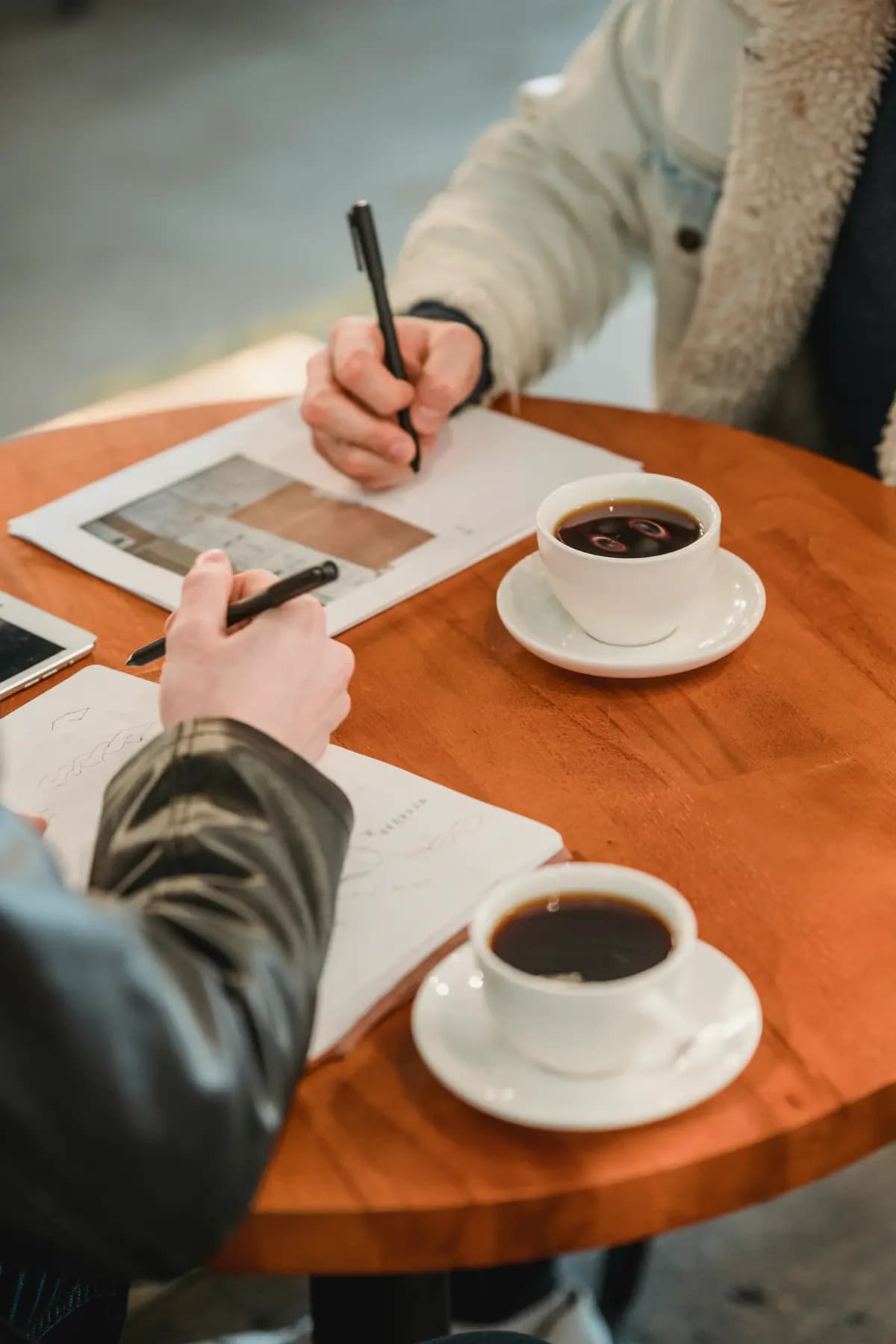 Nexeor team planning a client project over coffee